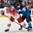 MINSK, BELARUS - MAY 24: Finland's Jere Karalahti #10 cross checks Czech Republic's Jaromir Jagr #68 during semifinal round action at the 2014 IIHF Ice Hockey World Championship. (Photo by Richard Wolowicz/HHOF-IIHF Images)

